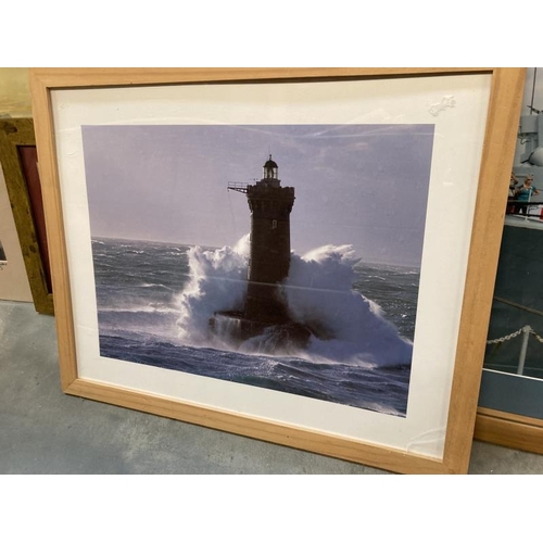 281 - 4 photographic prints featuring a battleship and three lighthouses. COLLECT ONLY