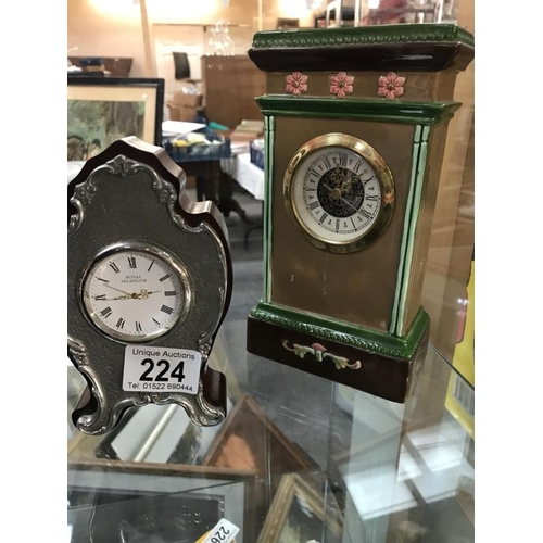 224 - A selection of clocks including Royal Salander