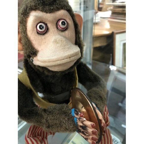 225 - An early Japanese battery operated monkey