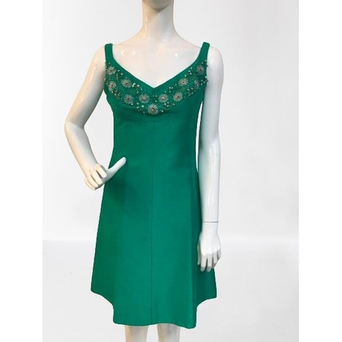 2045 - A Vintage 1970's A-line Cocktail dress. Bright green with Jewelled neckline size 10-12