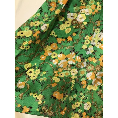 2047 - A Vintage 1970's handmade pure silk skirt. Bright green with floral print