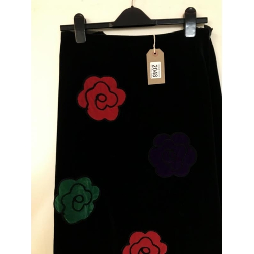 2048 - A 1970's Vintage flower power skirt. Black velvet with multicoloured velvet flower applique designer... 