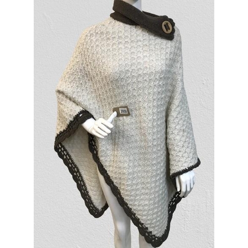 2050 - A Vintage Chunky Poncho shawl with brown trim and button detail to neck.