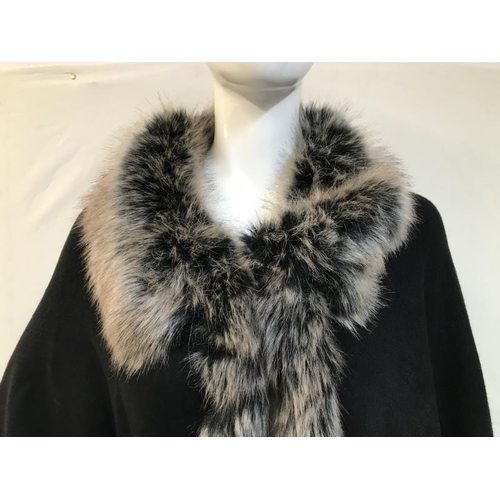 2063 - Sioni designed knitted cape with faux Fur from trim size S/M