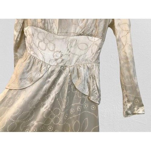 2086 - An original true vintage wedding dress, full length, circa 1940's 1950's in floral embossed silk, de... 