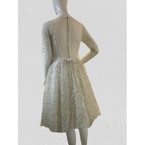 2087 - An original true vintage wedding dress circa 1960's, lace overlay with chiffon panel and floral rose... 