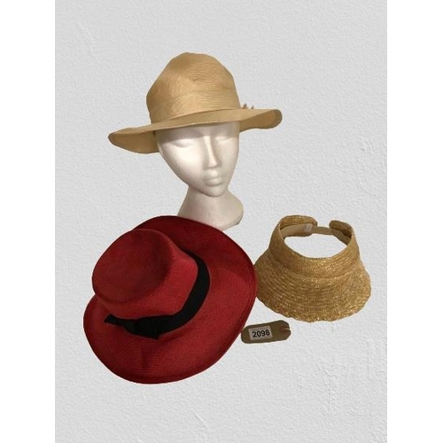 2098 - Two vintage straw hats, each with bow details, the beige hat is labelled Trikki by Edna Wallace, als... 