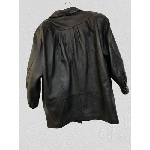 2117 - A leather coat by Jeffrey Brownleader. slight wear in places