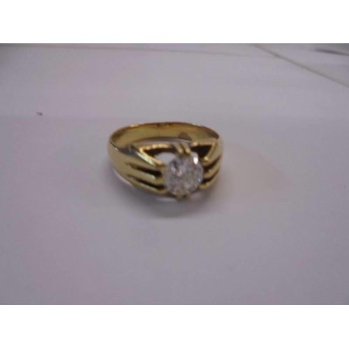 2 - A half carat diamond ring tests as 18ct gold, size N, 5.5 grams.