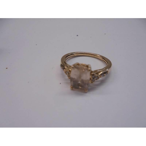 15 - A 14ct yellow gold morganite and diamond ring, size M half, 2.75 grams.