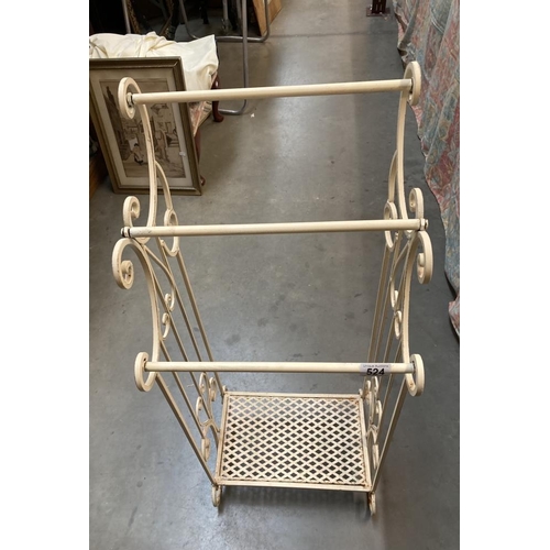 524 - A vintage ornate metal clothes rail