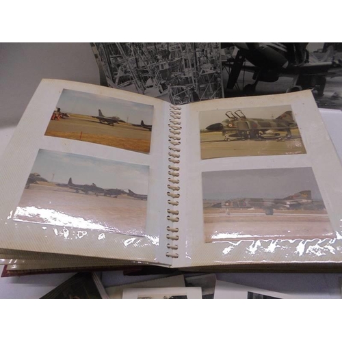 108 - An album of approximately 140 aircraft photographs and a quantity of loose photographs.