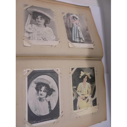 106 - An album of approximately 190 Edwardian mainly glamour postcards.