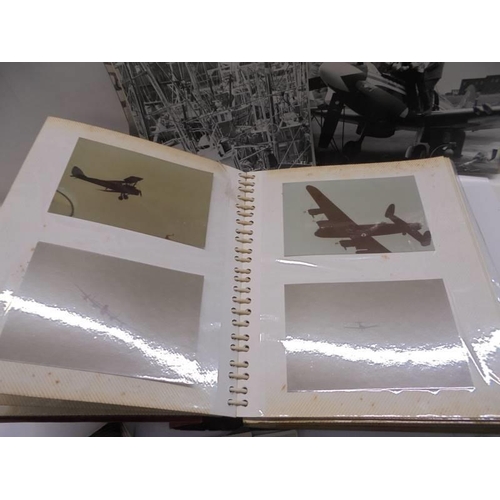 108 - An album of approximately 140 aircraft photographs and a quantity of loose photographs.