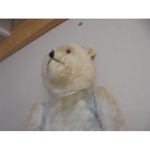 201 - A vintage Teddy bear, approximately 70 cm.