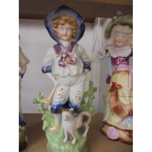 204 - Six 19th century ceramic figures including two pairs.