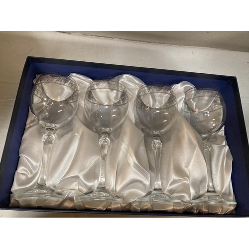 433 - A box of 6 crystal wine glasses & A boxed set of 4 Bohemia glasses