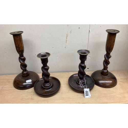 468 - 2 Pairs of wooden candlesticks