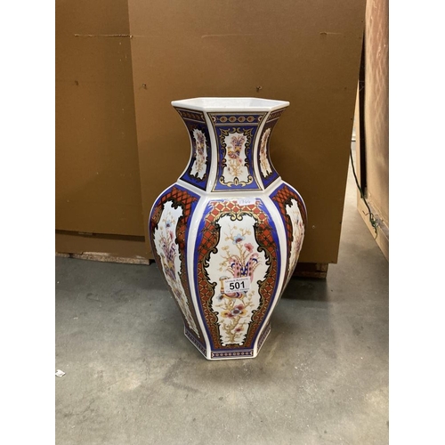 501 - A large gilded and coloured vase