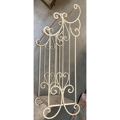 524 - A vintage ornate metal clothes rail