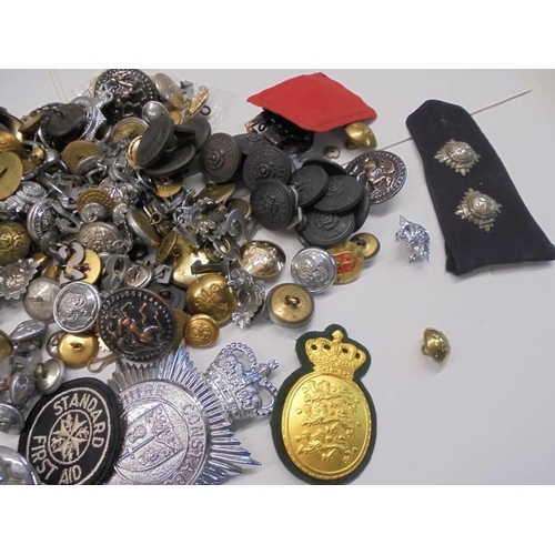 111 - A good collection of police badges, numbers, helmet pieces, fittings, plates etc., and some 1950's s... 