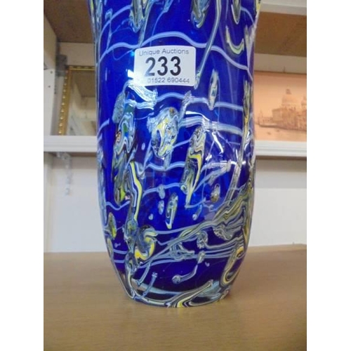 233 - A tall overlaid cobalt blue art glass vase, height 35 cm.