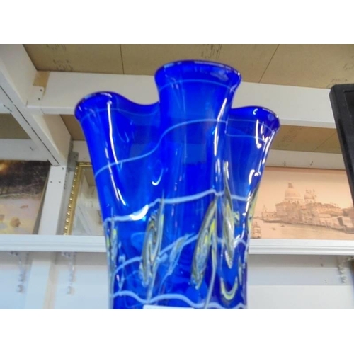 233 - A tall overlaid cobalt blue art glass vase, height 35 cm.