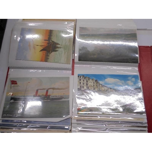 113 - Two albums of approximately 350 mainly topographical postcards.