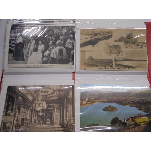 113 - Two albums of approximately 350 mainly topographical postcards.