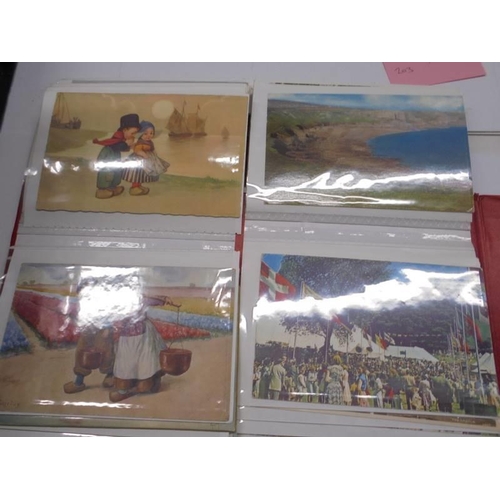 113 - Two albums of approximately 350 mainly topographical postcards.