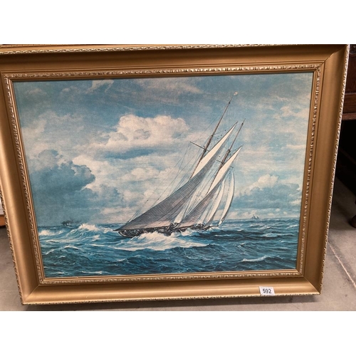 592 - A large oil on board yachting scene