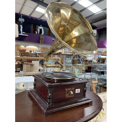 605 - A reproduction horn gramophone. Worked when tested.