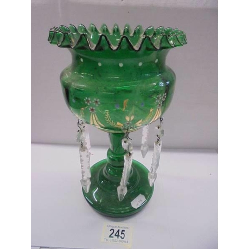 245 - A Victorian green glass hand decorated lustre.