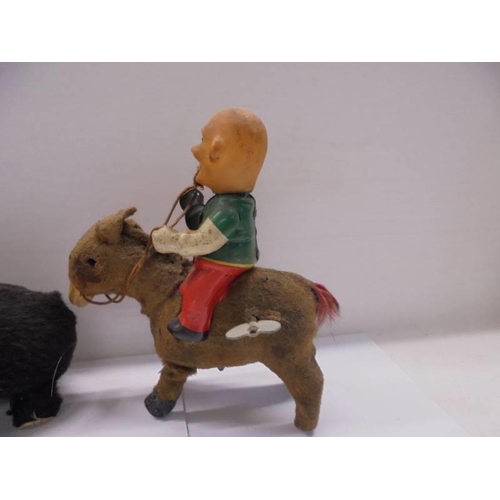 250 - A Japanese clockwork bear and two clockwork donkey's. not working.