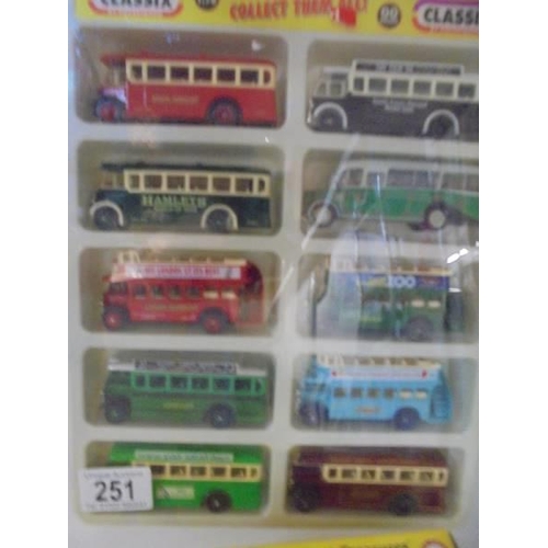 251 - A set of ten Classix collection vintage buses and three boxed commercial vehicles.