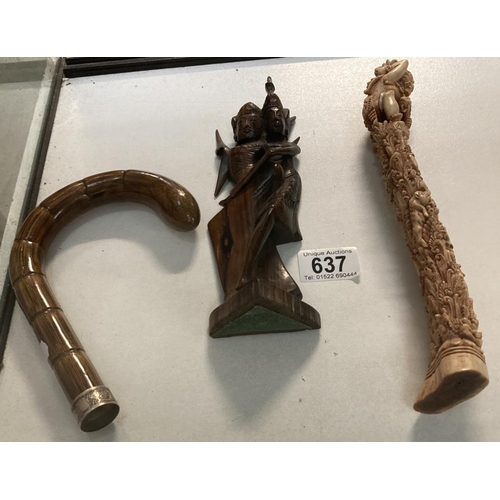 637 - An oriental carved bone statue, A silver beaded brolly handle & A carved wooden figure