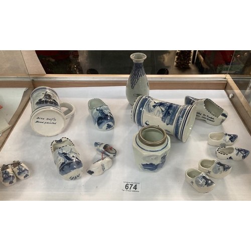 674 - A collection of modern delft-type blue & white ornaments including Vases, Tankards, Clogs etc