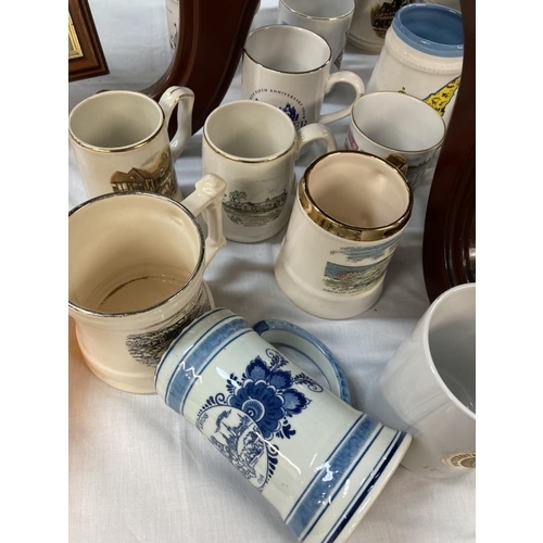 606 - A quantity of ceramic tankard mugs