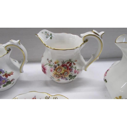 258 - Four Royal Albert 'Posies' graduated jugs and a pin dish.