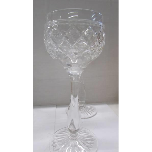 277 - A super quality cut glass decanter and six cut glass stemmed glasses. COLLECT ONLY.