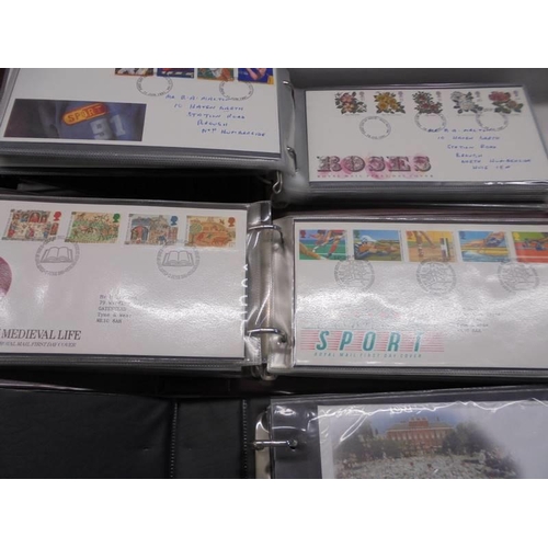 119 - Three albums of Royal Mail first day covers.