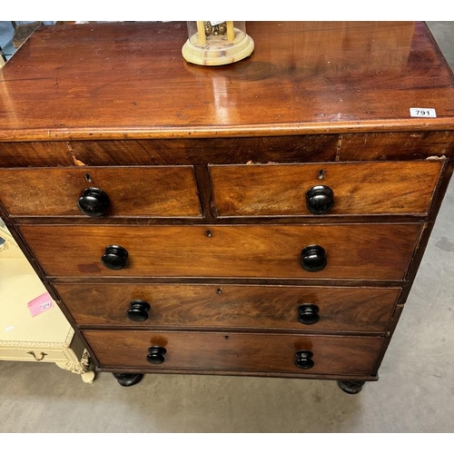 791 - A Victorian mahogany veneered chest of drawers