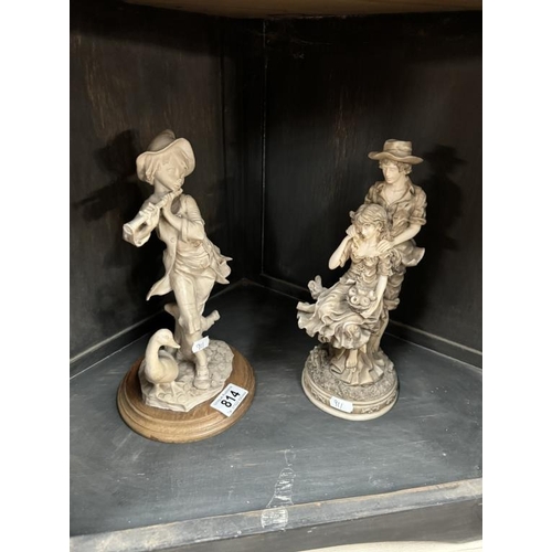 814 - Two ceramic figurines