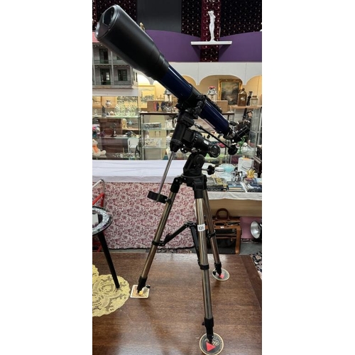 820 - A Bresser Sky live telescope on tripod stand