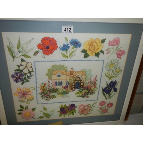 412 - Five framed and glazed cross stitch pictures. COLLECT ONLY.