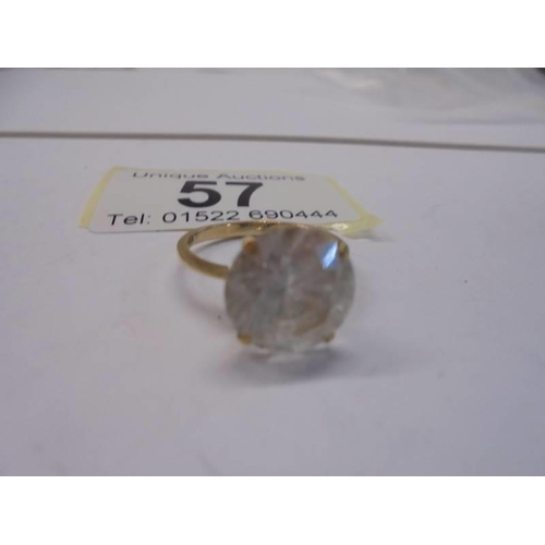 57 - A 9ct gold ring set white stone, size K, 2.8 grams.