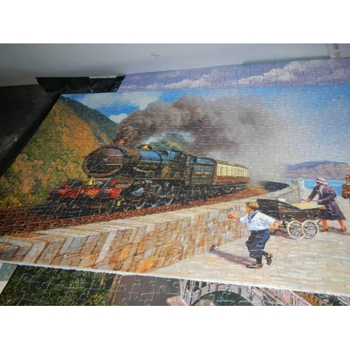 442 - Approximately ten completed steam engine jigsaw puzzles, COLLECT ONLY.