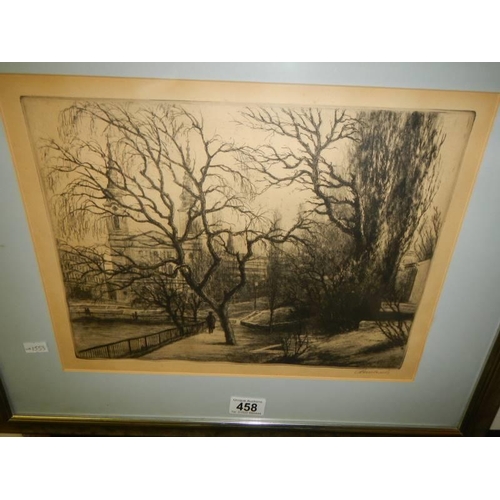 458 - A framed and glazed engraving street scene, signed but indistinct, COLLECT ONLY.