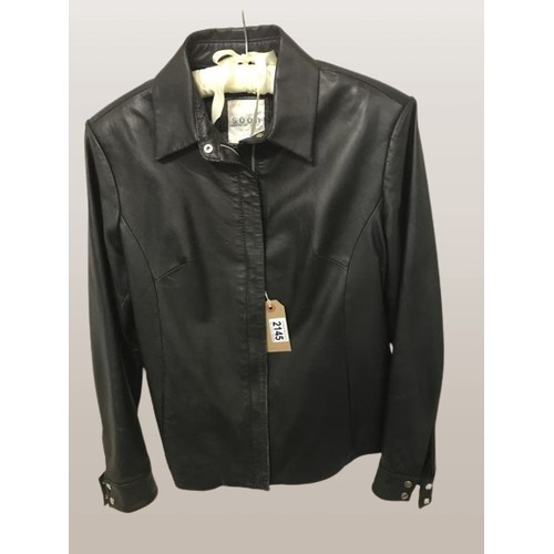 2145 - Black Leather short jacket. Age related marks & wear.