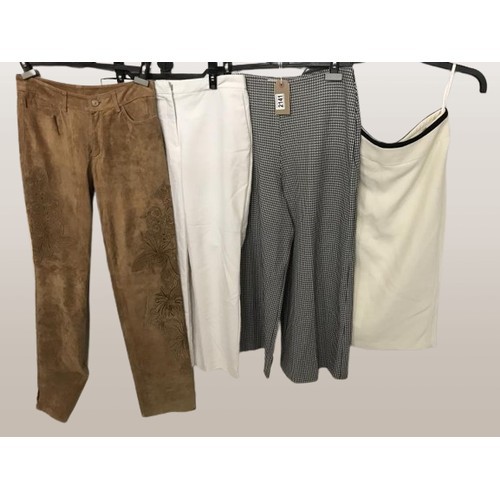 2141 - A collection of four pairs of trousers and one skirt. Including Zara